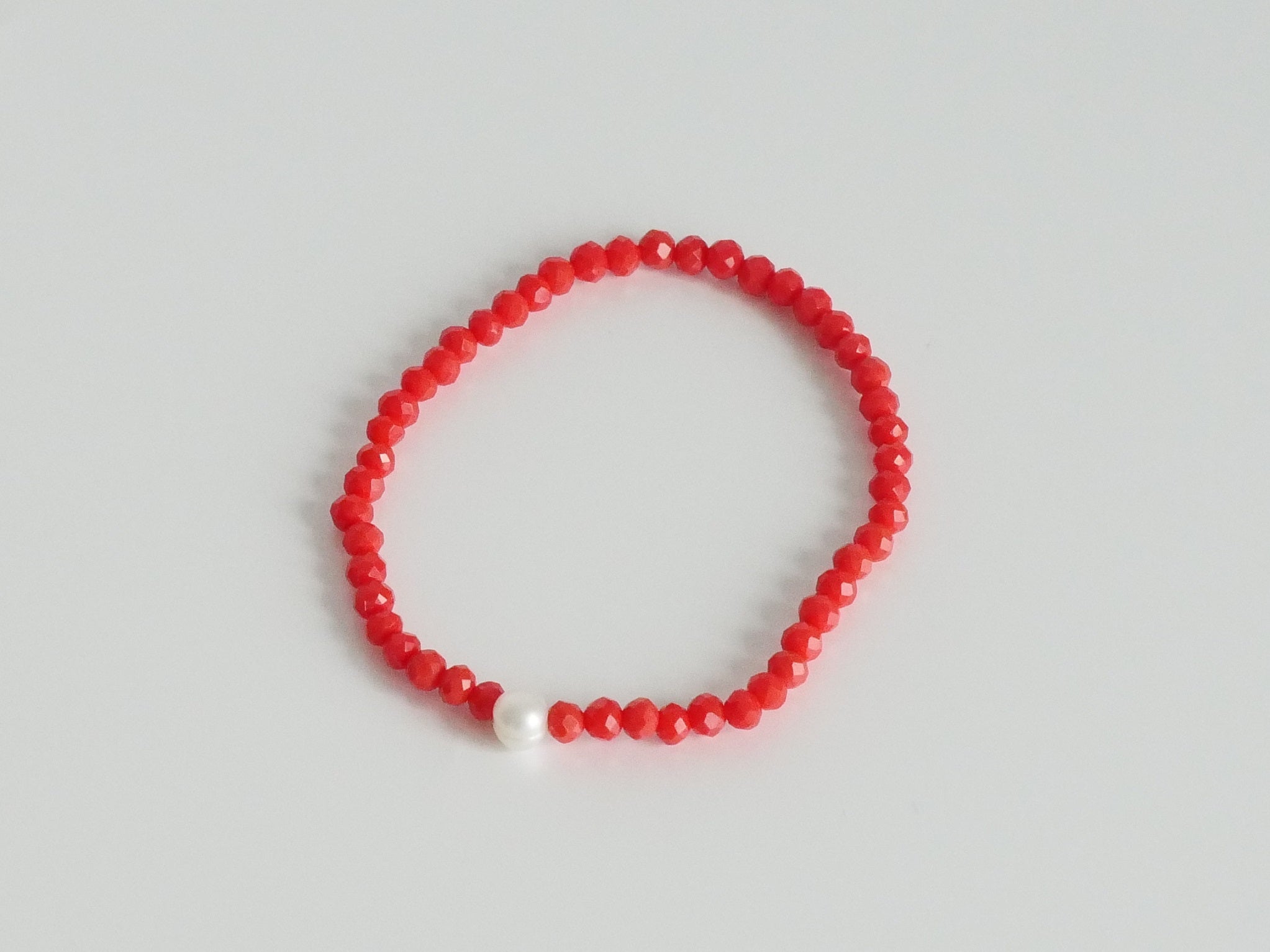 KISME Armband Süßwasserperle orange rot
